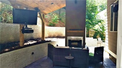 HGTV style entertaining with outdoor fireplace, tv