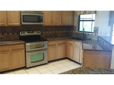 Kitchen with granite counters and ss appliances