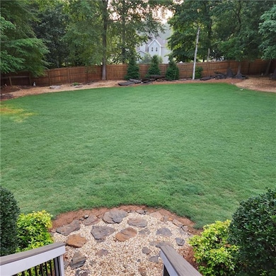 View of fenced backyard