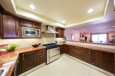 Huge gourmet kitchen with granite counters, recess