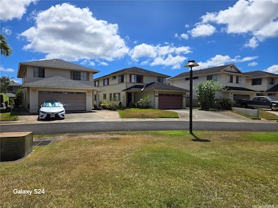 Middle dwelling with large driveway