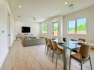 Dining area featuring light wood-style flooring, 