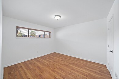 Bedroom flooring has been changed out to white/gre