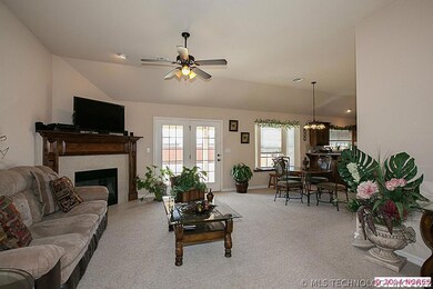 Living room is well lighted by wonderful French do