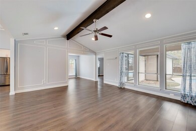 High ceilings with wood beam in the living space a