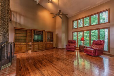 Open beautiful living room with pristine hardwood floors. 