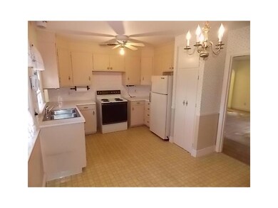 Kitchen. Charming kitchen opens to dining area and