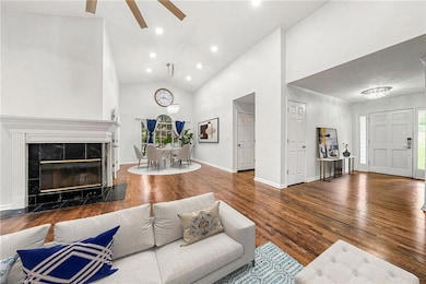 Virtually Staged  Living Area with Chandelier and Fresh Neutral Paint for a Modern, Clean Look