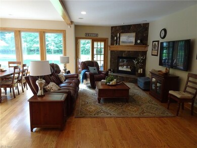 Living room to 4 season room and dining room