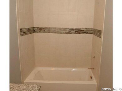 Bathroom Ceramic and mosaic tile tub surround