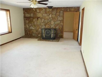 Large 22 1/2 foot living room with wood burning st