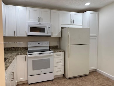 3150 NW 42nd Ave unit E401, Coconut Creek, FL 33066 - photo 6