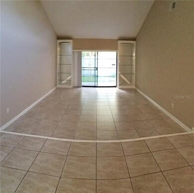 DINNING ROOM LOOKING AT LIVING ROOM AND SLIDER TO 