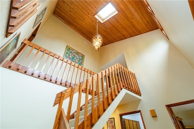 The tongue and groove ceiling, with a skylight enh