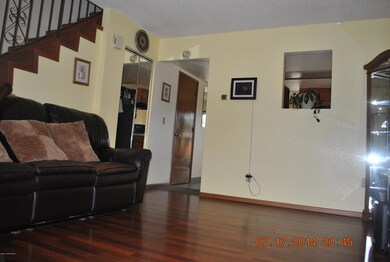 Living Room With Newer Cherry Wood Floor