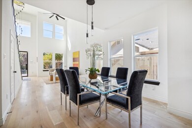 This is a bright and modern dining space featuring
