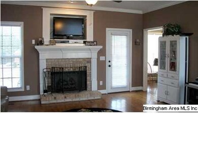 Neutral wall colors and clean hardwoods are move-i