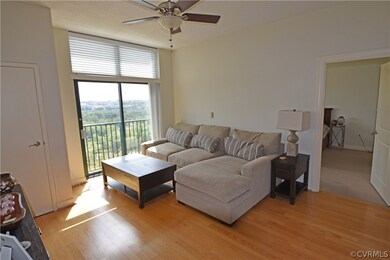 Great Room with sliding doors to French balcony ov