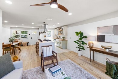 Living room featuring light hardwood / wood-style 