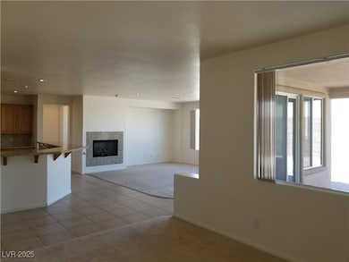 Unfurnished living room featuring a high end firep