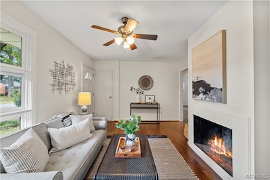 Living room featuring light hardwood flooring and