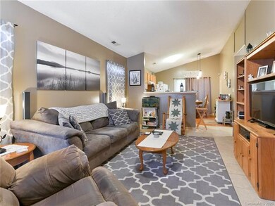 SPACIOUS LIVING ROOM OPEN TO KITCHEN/BREAKFAST ARE