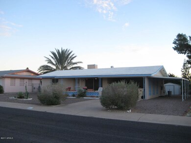 Front of Home with View of Extra Carport