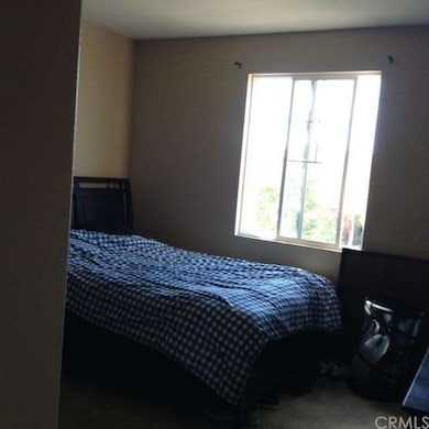 Bedroom with view of backyard