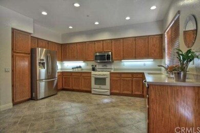 Spacious gourmet kitchen complete with lovely gard