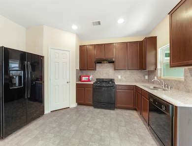 Spacious kitchen with granite countertops. All app