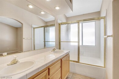 Master bath features dual sinks plus a tub/shower