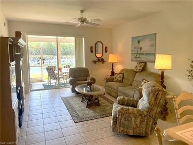 Living room featuring light tile patterned floors 