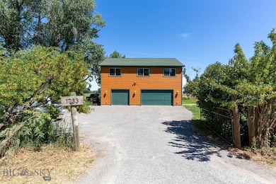 3 car garage with shop an apartment above