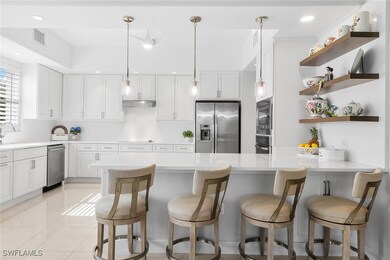 583 Avellino Isles Cir unit 202, Naples, FL 34119 - photo 2