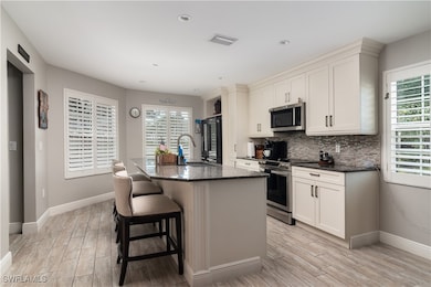 830 Meadowland Dr unit A, Naples, FL 34108 - photo 7