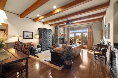 Natural Wood Beams Accent the Great Room