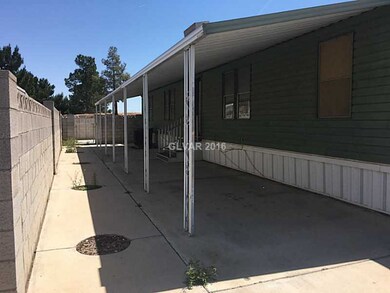Property Photo. Front covered patio.
