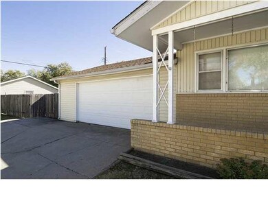 Wide driveway for extra parking. Convenient for a 