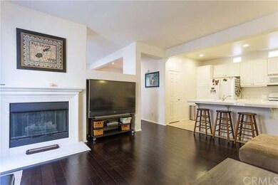 Fireplace and door to backyard