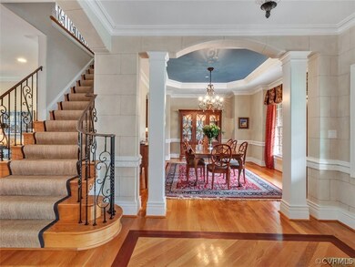 Foyer showing detail of the hardwood floors ~ arch