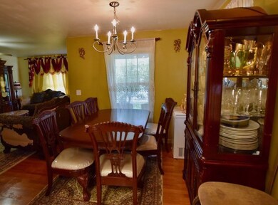 Area off the kitchen can be formal dining area or a home office.  