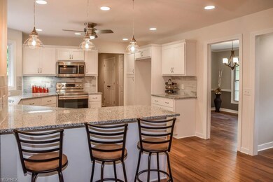 The kitchen has a breakfast bar and a pantry.