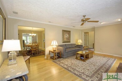 View 2 of living area leading to dining room