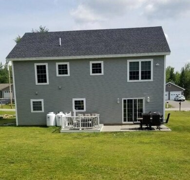 Back of home with new patio