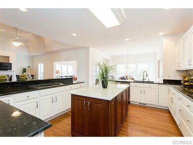 New furniture-style island in contrasting wood-ton