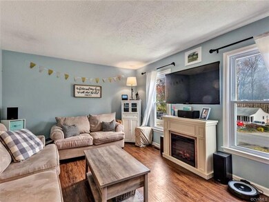 Fireplace overlooking wood Laminate flooring