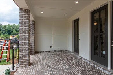 View of patio  with sliding glass doors , Front En