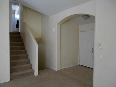 Stairways to Upper & Lower Levels Upon E