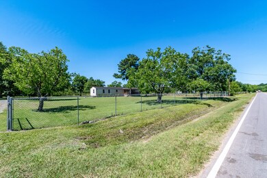 The property is partial fenced but does have an en