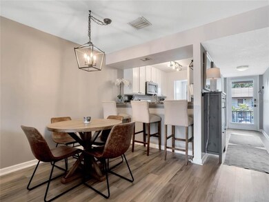 Dining area with updated light fixture